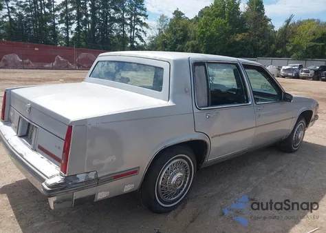 1986 Cadillac Deville Fleetwood z USA, uszkodzony, nr VIN 1G6CD6988G4311095